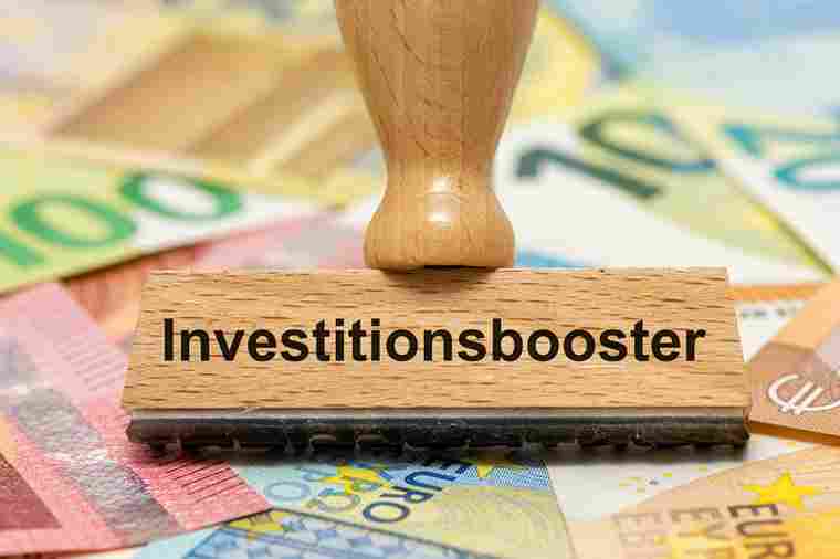 © Wolfilser - stock.adobe.com Stempel Investitionsbooster
